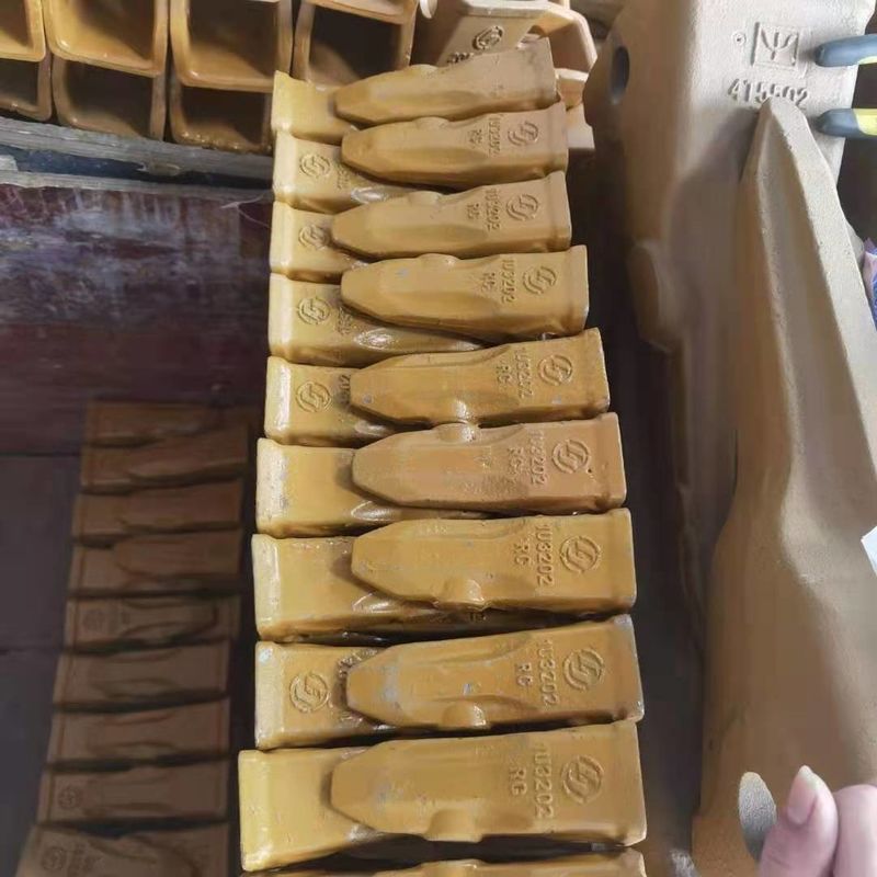 Adaptador de dientes para excavadoras y placa de cuchilla mejor precio y dientes duros para cubos