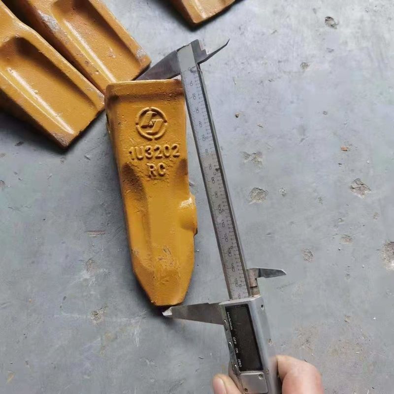 La excavadora de dientes de cubo mejor precio y rígido Diente de cubo duro Pin Diente de cubo