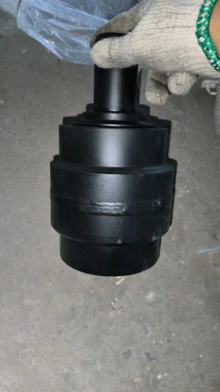 Sk200 piezas de excavadora debajo del chasis piezas de pista de enlace de pista de zapatos de pista de rodillo de arriba abajo rodillo Sprokcet idler