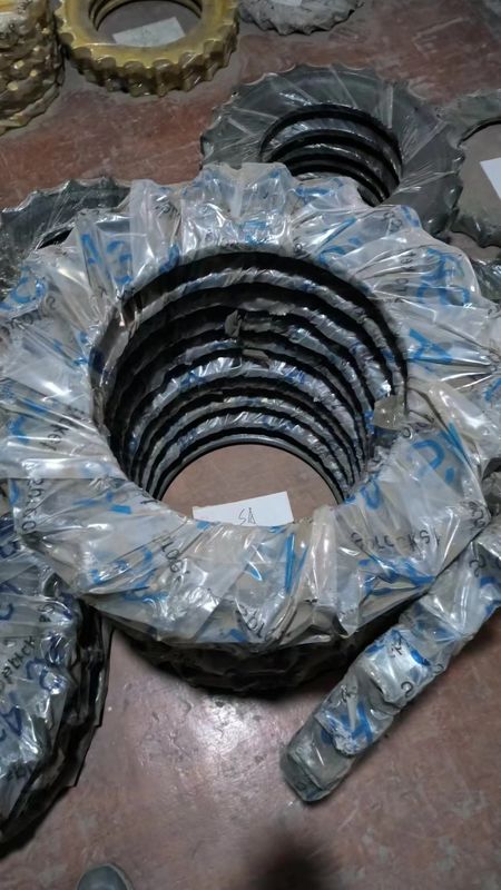 Sk200 piezas de excavadora debajo del chasis piezas de pista de enlace de pista de zapatos de pista de rodillo de arriba abajo rodillo Sprokcet idler