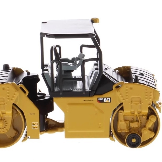1:64 DM CB-13 Modelo de rodillo vibratorio Caterpillar Vehículo de ingeniería de la construcción 85630