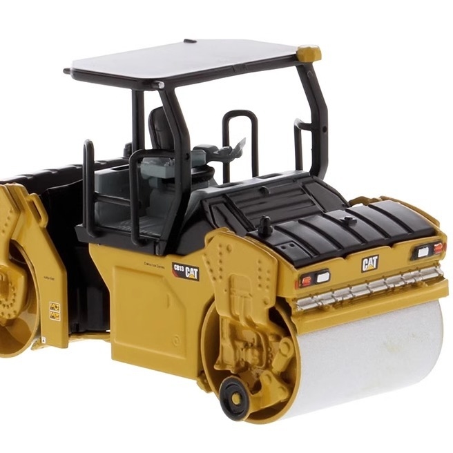 1:64 DM CB-13 Modelo de rodillo vibratorio Caterpillar Vehículo de ingeniería de la construcción 85630