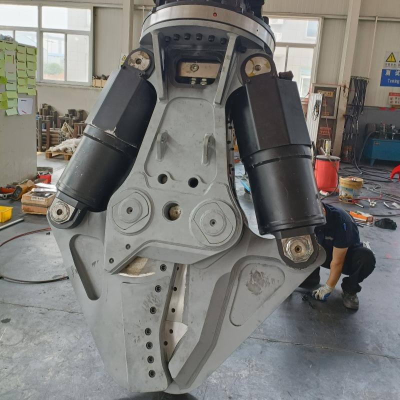 Fabrica personalizar excavadora de trabajo pesado escombros hidráulicos de metal de corte de automóviles antiguos de corte de buques de corte de hojas afiladas 360 ° rotación de barras de acero de tuberías de corte